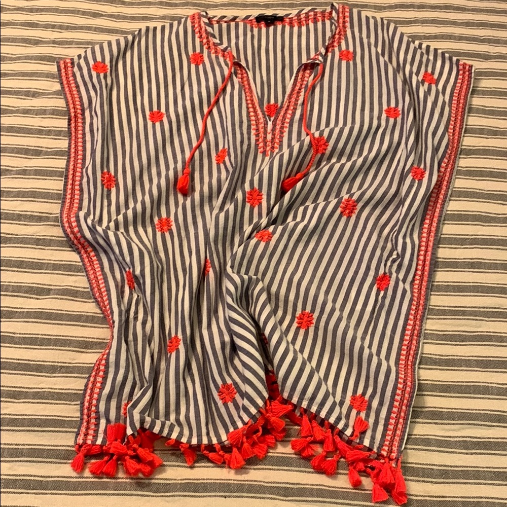 Striped blue and white cover up with orange accents and fringe